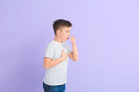 kid coughing with asthma